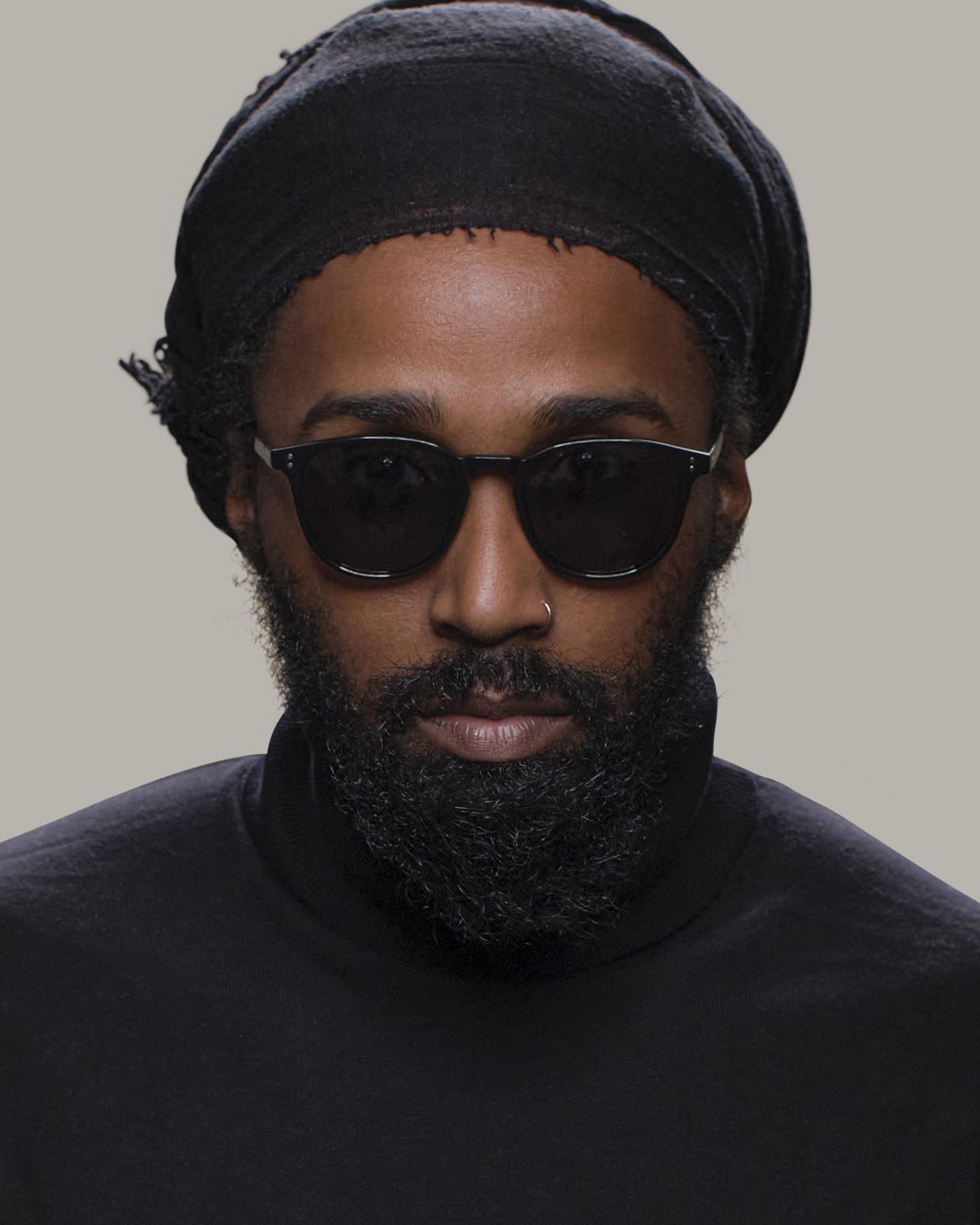 Headhsot of man in Grayman and Company black KH11 wayfarer sunglasses