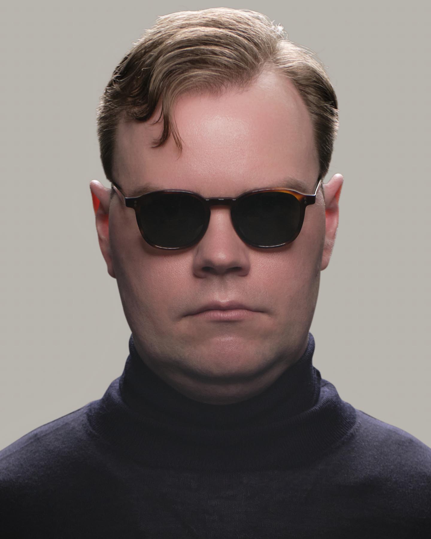 Headshot of man in tortoise Grayman and Company KH12 wayfarer ballistic impact resistant sunglasses